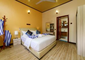Postel nebo postele na pokoji v ubytování Sea View Villa Ukulhas
