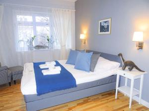 Posteľ alebo postele v izbe v ubytovaní Hornigold Apartament Gdynia