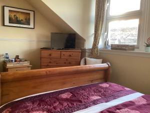 Postel nebo postele na pokoji v ubytování Struan House B&B