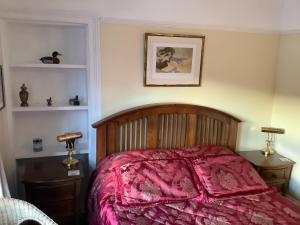 Postel nebo postele na pokoji v ubytování Struan House B&B