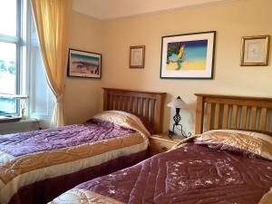 Postel nebo postele na pokoji v ubytování Struan House B&B
