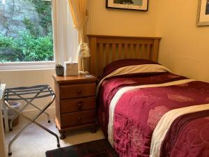 Postel nebo postele na pokoji v ubytování Struan House B&B