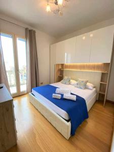 Giường trong phòng chung tại Luxury Residence Gallipoli