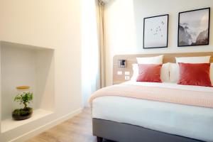 Łóżko lub łóżka w pokoju w obiekcie Bergamo Inn 15