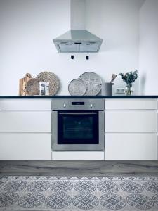Η κουζίνα ή μικρή κουζίνα στο Day Dream Central Akureyri Two Bedroom Apartment