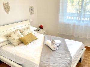 Ein Bett oder Betten in einem Zimmer der Unterkunft APARTBEACH CYE 6 CLIMATIZADO y JUNTO PLAYA