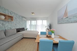 Posedenie v ubytovaní Bella Flora Apartman