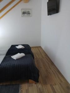 Ліжко або ліжка в номері Rooms Jozo