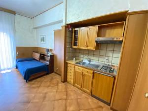 A kitchen or kitchenette at Residence Hotel Valery