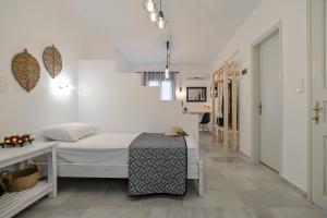 Кровать или кровати в номере Casa Verde Di Naxos