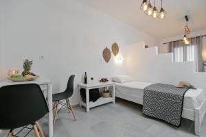 Кровать или кровати в номере Casa Verde Di Naxos