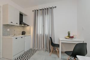 Кухня или мини-кухня в Casa Verde Di Naxos
