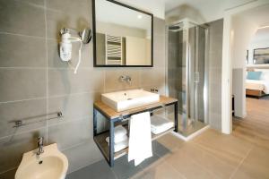 Łazienka w obiekcie Bergamo Inn 15