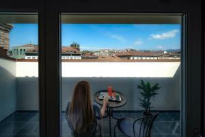 Balkon lub taras w obiekcie Bergamo Inn 15