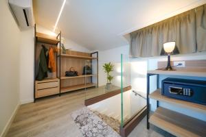 Łóżko lub łóżka w pokoju w obiekcie Bergamo Inn 15