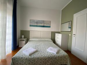 Posteľ alebo postele v izbe v ubytovaní Residence Hotel Valery