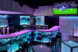 TV o dispositivi per l'intrattenimento presso Hillgrove Guesthouse