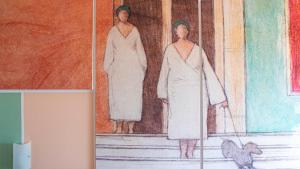 a drawing of two women standing in a room at Hotel Royal in Giulianova