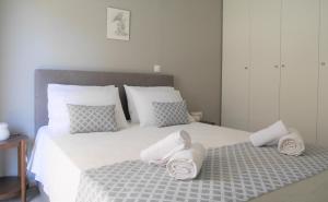 Posteľ alebo postele v izbe v ubytovaní Porto Plaza City Center Apartment AC/Wifi