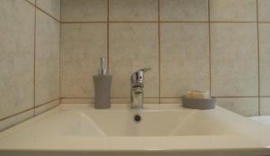 Kúpeľňa v ubytovaní Porto Plaza City Center Apartment AC/Wifi