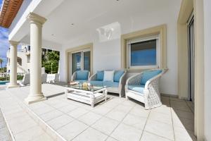 Patio alebo iná vonkajšia časť ubytovania Villas Guzman - Raphael