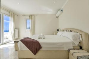 Posteľ alebo postele v izbe v ubytovaní Villas Guzman - Raphael + 37 fotografií
