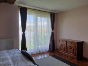 Postel nebo postele na pokoji v ubytování Lidia House