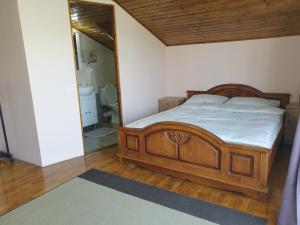 Postel nebo postele na pokoji v ubytování Lidia House