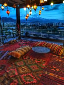 a living room with a view of a city at The Kayseri Loft Hotel in Kayseri