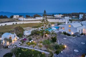 an aerial view of a house with a yard at La Maison Private Villa in Agia Paraskevi