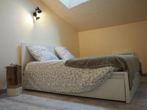 Кровать или кровати в номере La Meïzou de Bouly