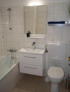 Kylpyhuone majoituspaikassa Apartment Noemi