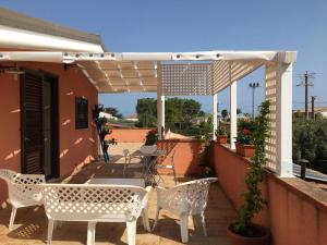 Balkón alebo terasa v ubytovaní La stanza delle Muse in Villa con Piscina