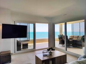 A television and/or entertainment centre at 213 Luxury Panorama - Alicante Holiday