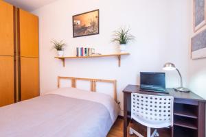 Postel nebo postele na pokoji v ubytování Milano Guest House