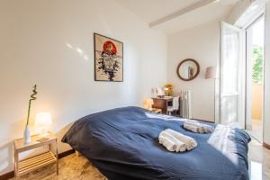 Postel nebo postele na pokoji v ubytování Milano Guest House