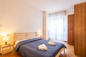 Postel nebo postele na pokoji v ubytování Milano Guest House