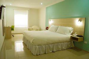 Vajamar Hotel客房内的一张或多张床位