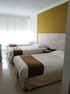 Vajamar Hotel客房内的一张或多张床位