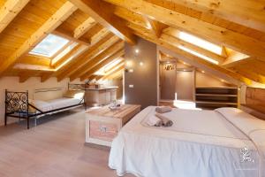 Cama ou camas em um quarto em Il Grifo