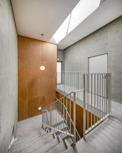 a staircase in a building with a skylight at Laon on 37 in Tongyeong