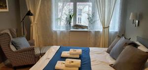 Posteľ alebo postele v izbe v ubytovaní Hornigold Apartament Gdynia