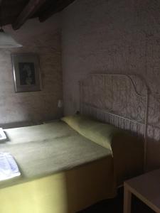Postel nebo postele na pokoji v ubytování B&B Etico La Casa di Toti