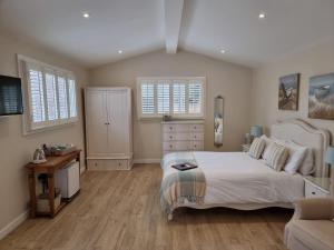 Кровать или кровати в номере Willow House B&B