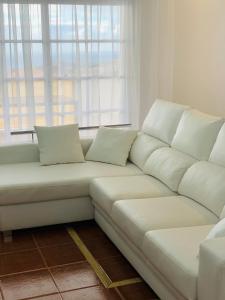 A seating area at Duplex Penthouse Panoramic Del Atlantico