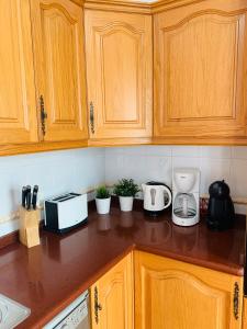 A kitchen or kitchenette at Duplex Penthouse Panoramic Del Atlantico