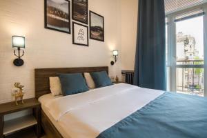 Postel nebo postele na pokoji v ubytování Scandinavian Apartments
