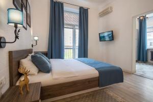 Postel nebo postele na pokoji v ubytování Scandinavian Apartments