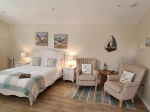 Кровать или кровати в номере Willow House B&B