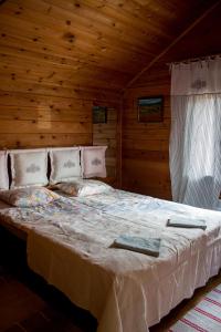 Postel nebo postele na pokoji v ubytování Cottage Kesäranta